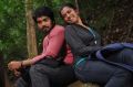Jithesh, Riya in Thalakonam Tamil Movie Stills