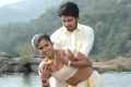 Jithesh, Riya in Thalakonam Tamil Movie Stills