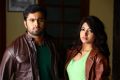 Unni Mukundan, Akanksha Puri in Thigar Movie Stills