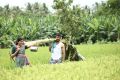 Anumol, Kishore in Thilagar Movie Stills