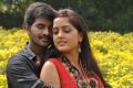 Dilip Kumar, Divya Singh in Thiruppugazh Movie Stills