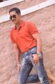 Telugu hero Uday Kiran Orange T Shirt & Blue Jeans