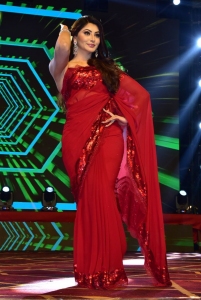 Urvashi Rautela Red Saree Pics @ Waltair Veerayya Pre Release