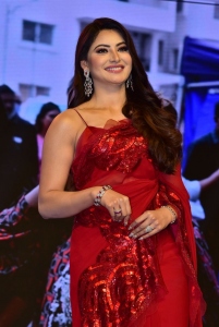 Urvashi Rautela Red Saree Pics @ Waltair Veerayya Pre Release