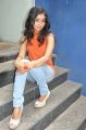 Tamil Actress Uthara Unni Stills in Orange Top & Jeans