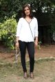 Actress Varalaxmi Sarathkumar Photos in White Top & Black Pant