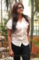 Actress Varsha Ashwathi in White Shirt Photo Shoot Stills