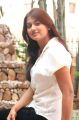 Varsha Ashwathi Hot Photo Shoot Stills in White Shirt