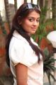 Varsha Ashwathi Hot Photo Shoot Stills in White Shirt