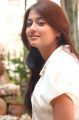 Varsha Ashwathi Photo Shoot Stills in White Shirt