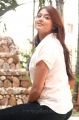 Varsha Ashwathi Photo Shoot Stills in White Shirt