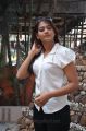 Varsha Ashwathi Hot Photo Shoot Stills in White Shirt